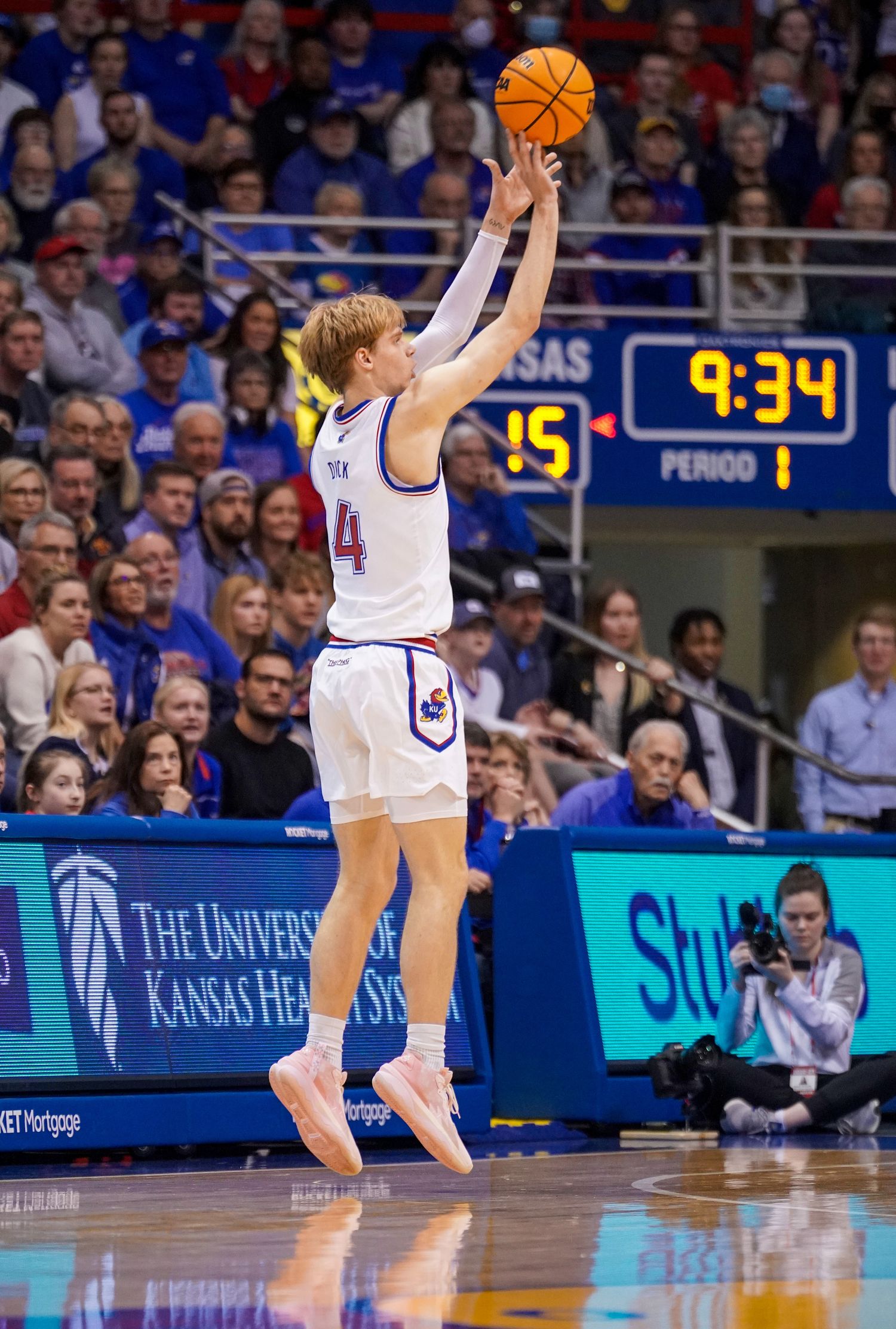 Jan 14, 2023; Lawrence, Kansas, USA; Kansas Jayhawks guard Gradey Dick (4) shoots a three point basket against the Iowa State Cyclones during the first half at Allen Fieldhouse.